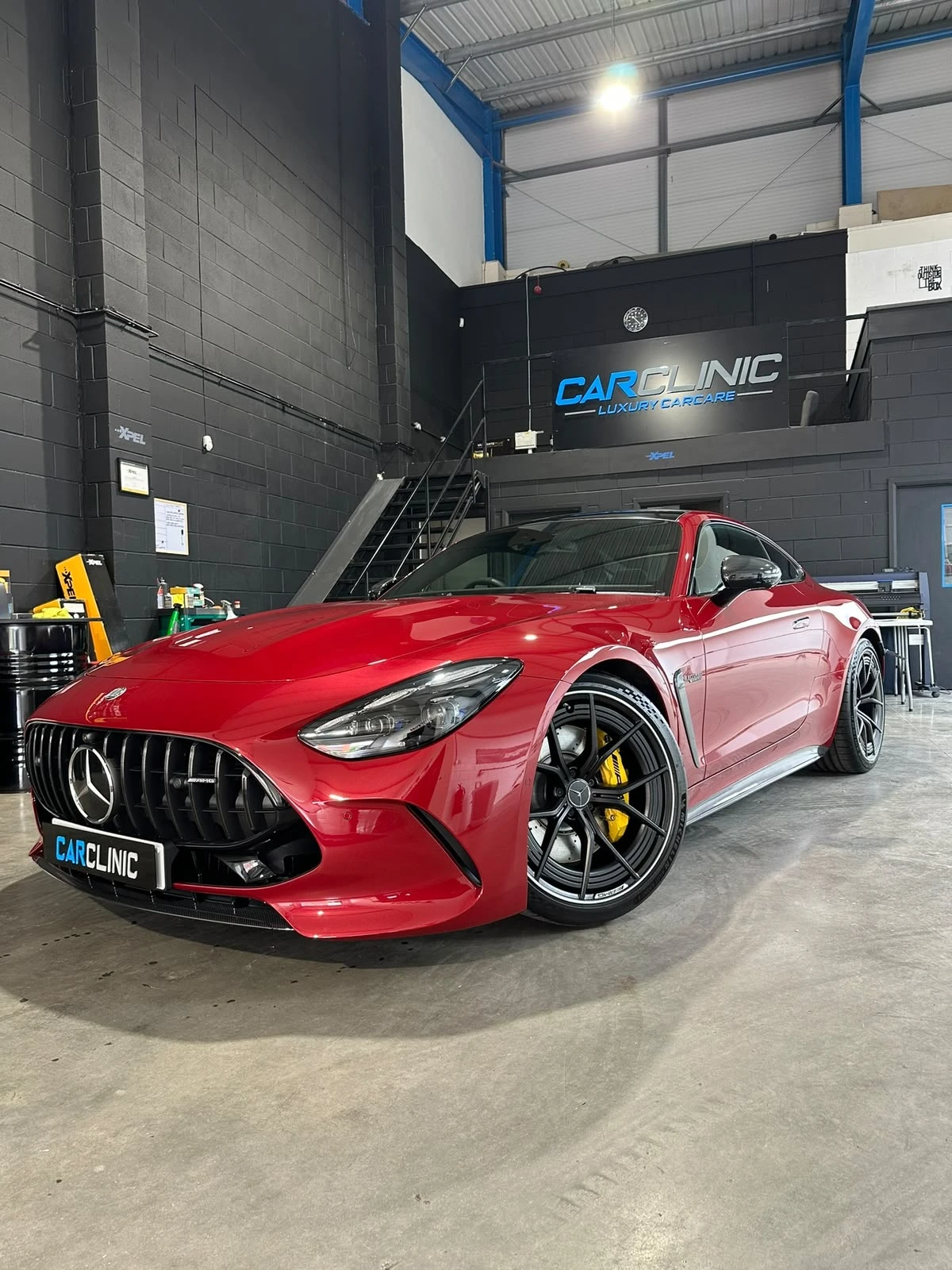 Red Mercedes-AMG GT in the Car Clinic Northwest studio in Bolton after XPEL paint protection film